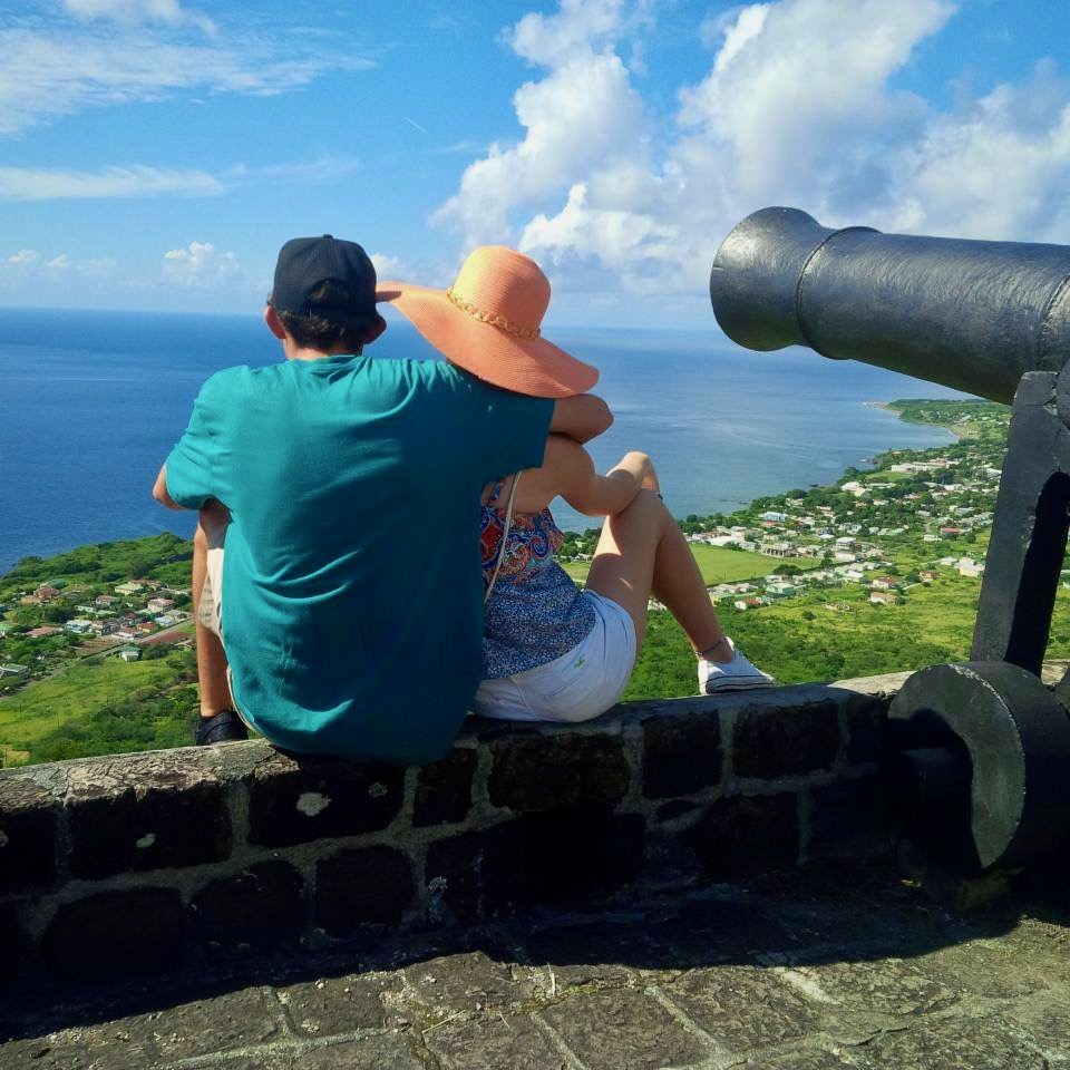 Couple enjoying the view at Brimstone Hill with cannon
